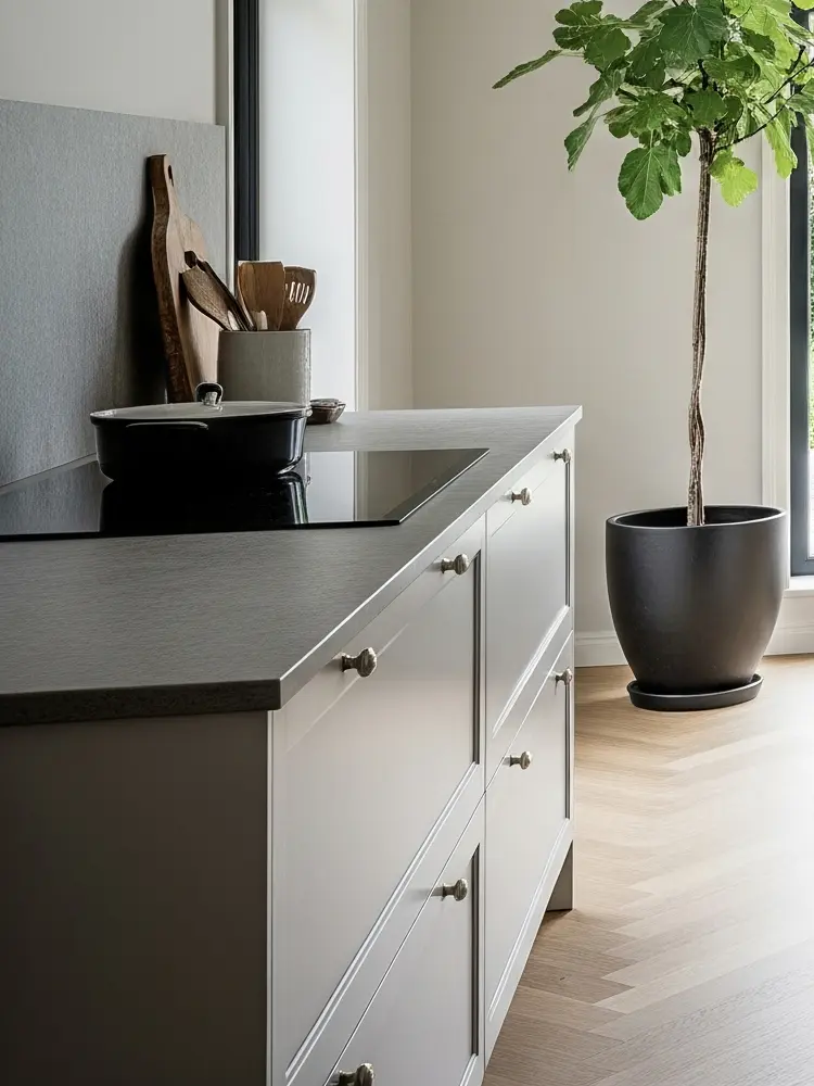 Duo framed doors with double levels and crisp lines in a bright kitchen where natural light enhances the form.