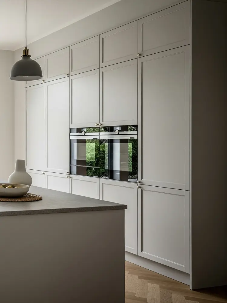 Duo framed doors in a dark tone with a bold architectural expression and clearly layered structure.